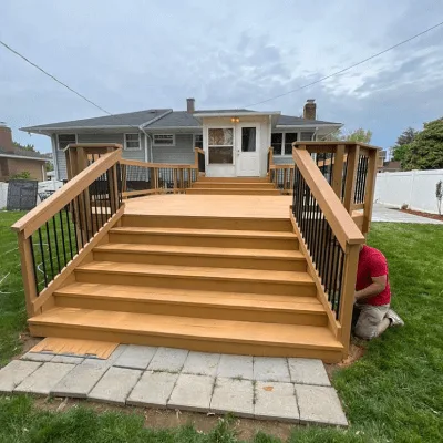 Stained wood deck stairs and railing built by Master Touch in Maryland