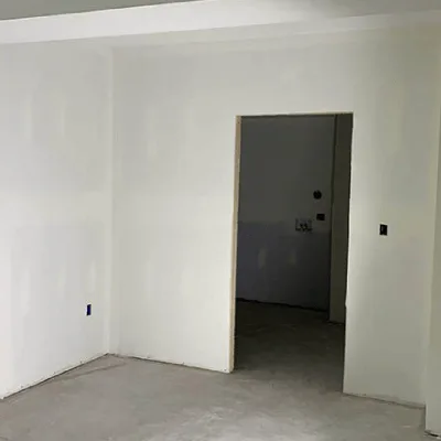 Finished drywall installation ready for paint